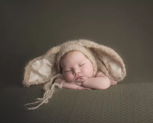 Michelle White Photography - baby in brown knit ears headdress