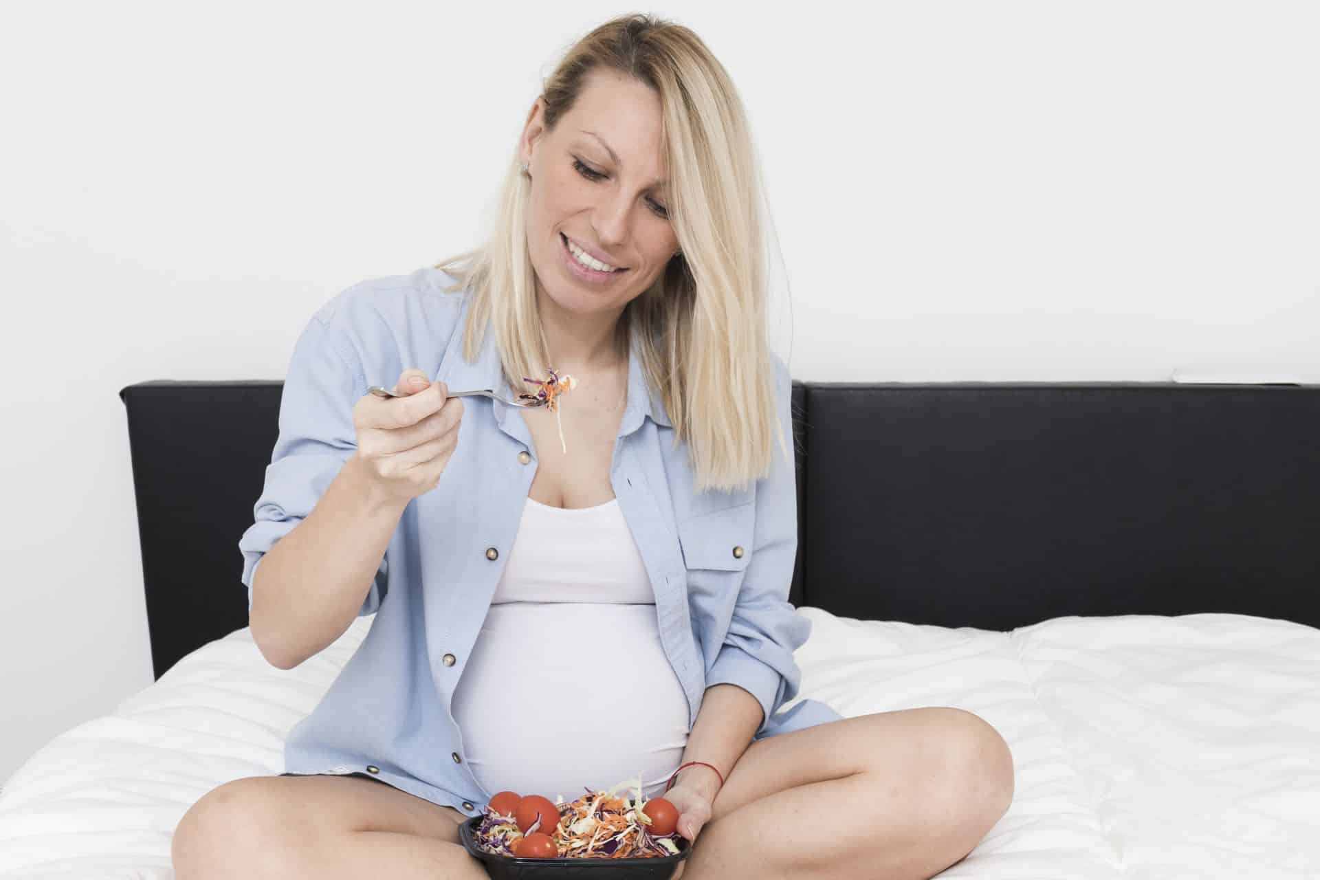 Self Care in Pregnancy - Lady with healthy food